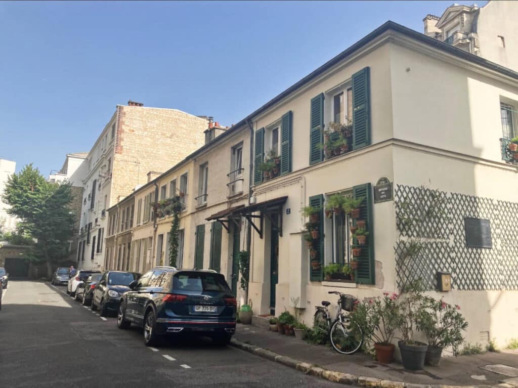 Cars parked along the street in 12th Arrondissement neighborhood