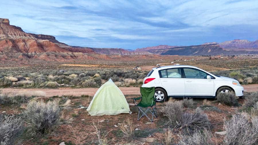 View of a car, tent and camping chair at a Utah national park