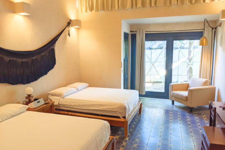 Two beds in a room at Hotel Waye