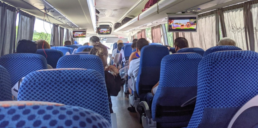 View inside the ADO bus filled with passengers from the back part