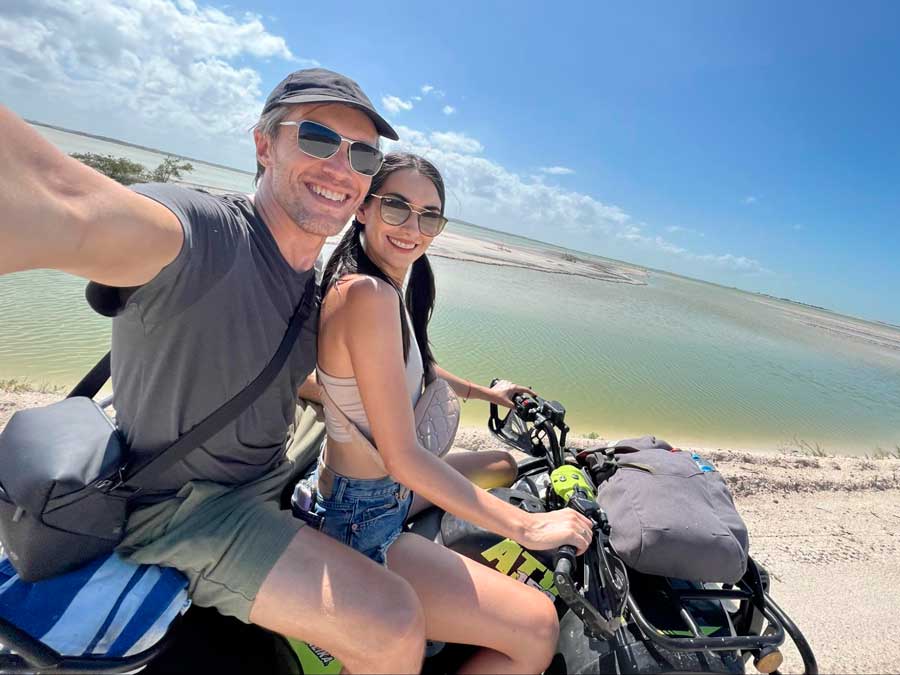 Nate and Clara riding an ATV in Las Coloradas