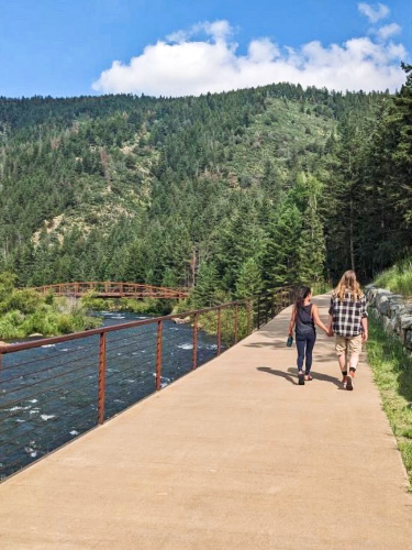 Travel Lemming editor Abigail Bliss and her husband, walking along the paved pathway