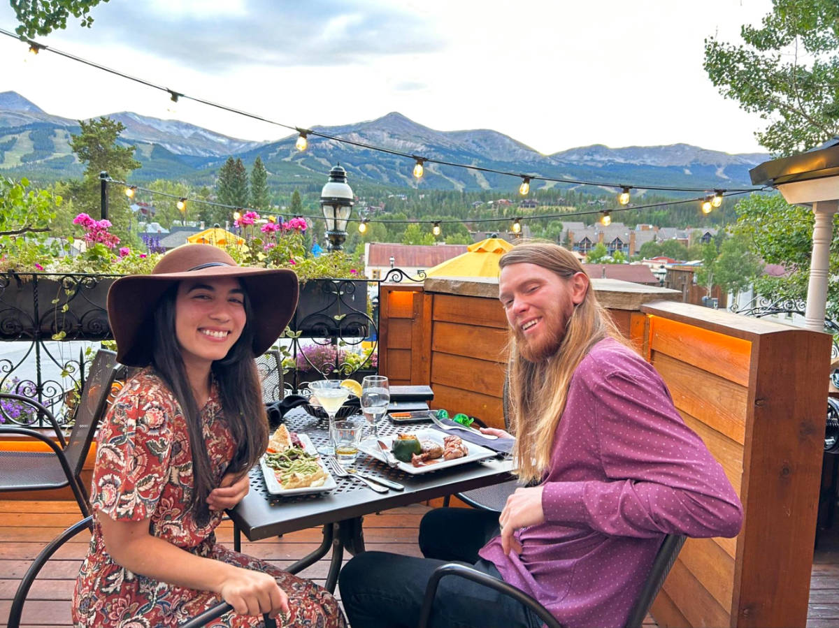 Travel Lemming Editor Abigail Bliss and her husband, posing for a photo at their dinner in downtown Breckenridge