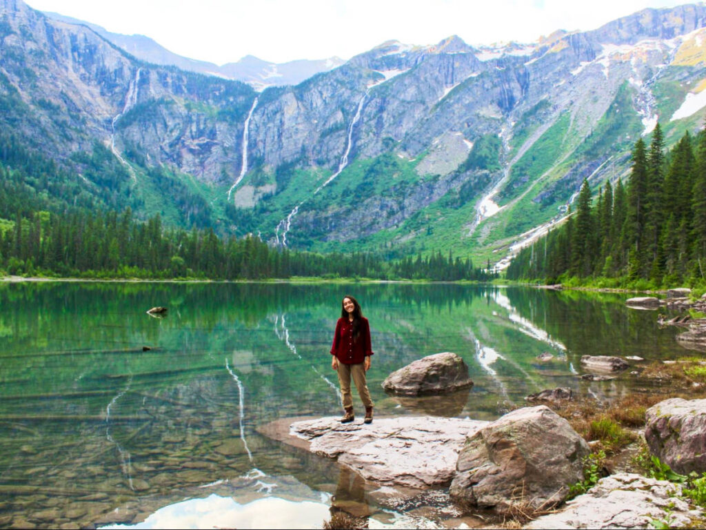 The author Abigail Bliss, posing for a photo at the Glacier National Park