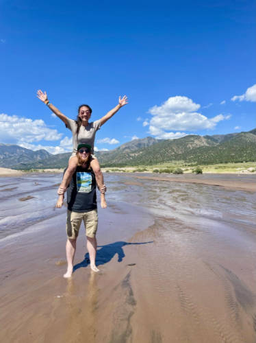 Travel Lemming editor, Abigail Bliss with her husband at the Medano Creek