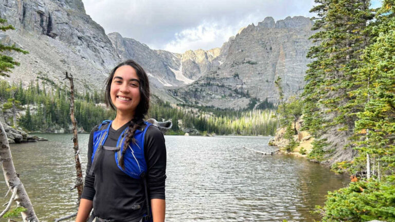 The author Abigail Bliss with the scenic views on the trail to Sky Pond