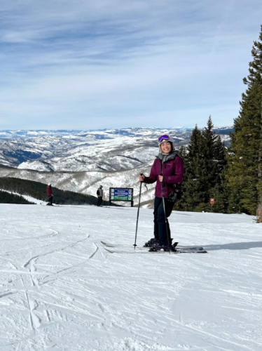 The author, Abigail Bliss smiling for a photo in Vail Ski Resort