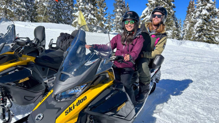 The author, Abigail Bliss with her husband on a snowmobile