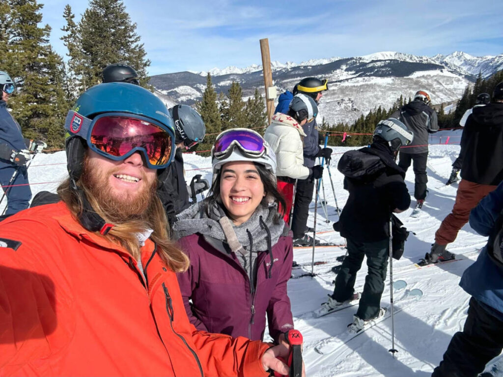 The author, Abigail Bliss with her husband smiling for a photo in Vail Ski Resort