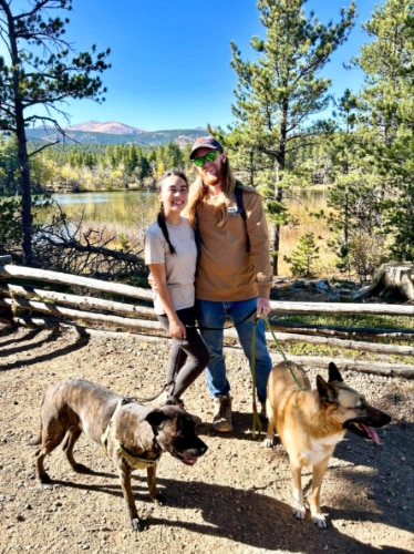 The author Abigail Bliss with her family, posing in the middle of the scenic Mud Lake Open Space