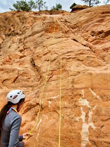 Travel Lemming editor Abigail, readying to climb at Red Rock Canyon Open Space