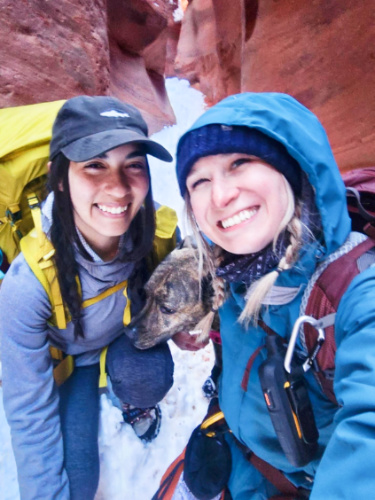 The author, Abigail, and her friend posing on their hike in Utah