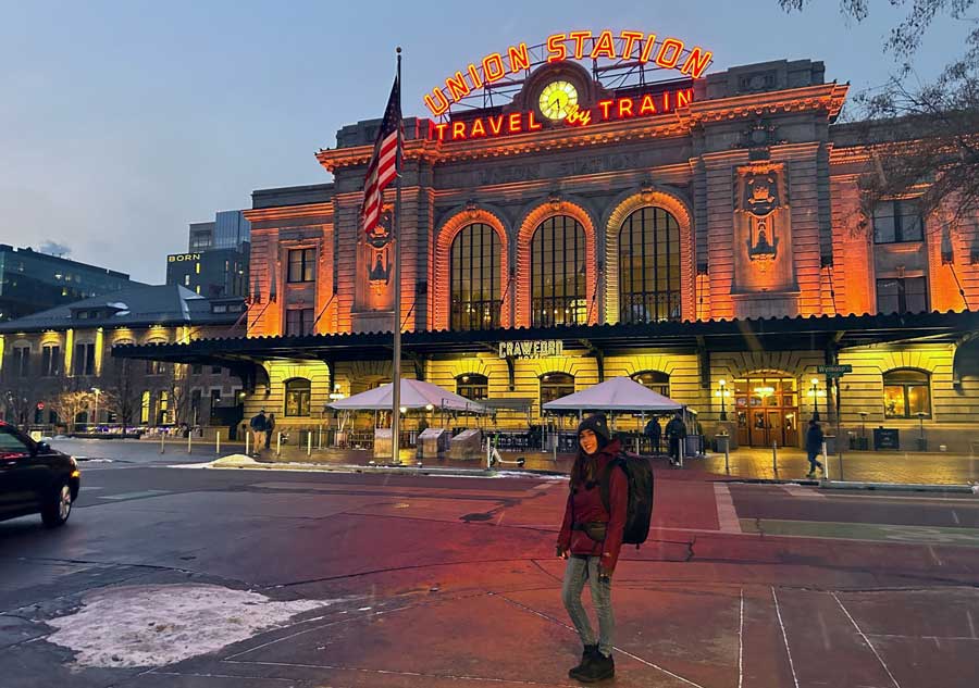 Abigail posing for a photo outside the Denver Union Station