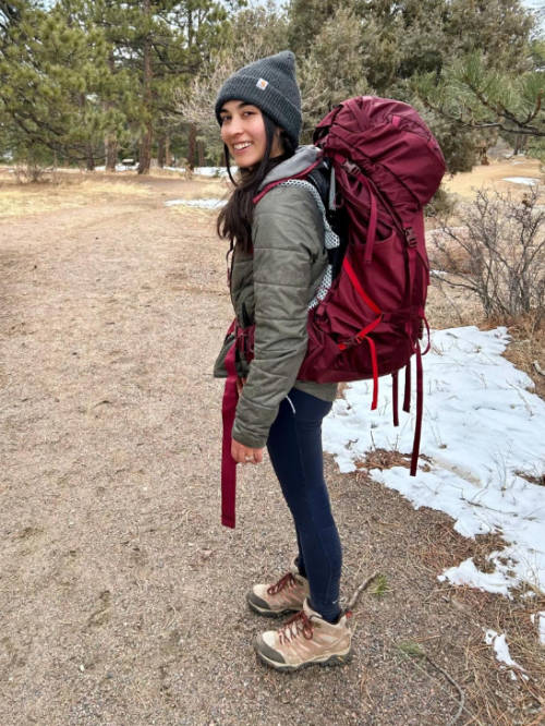 View of how the Osprey Aura AG LT 65 backpack fits on Abigail