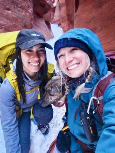 Travel Lemming's Editor Abigail and her friend, posing at the slot canyon