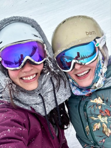 Travel Lemming editor Abigail Bliss and her friend on a full gear for snowboarding