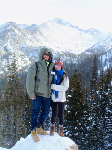 Travel Lemming editor Abigail Bliss, and her husband posing with the snowy views
