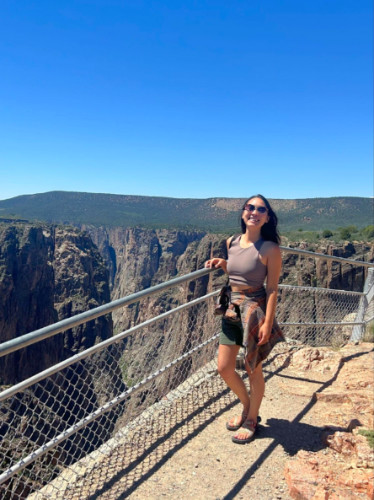 Abigail standing near the fence at Black Canyon of the Gunnison