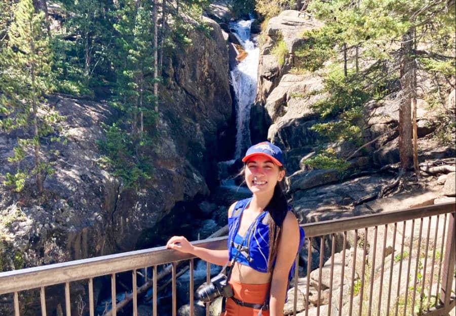 The author, Abigail posing with the Chasm Falls in the background