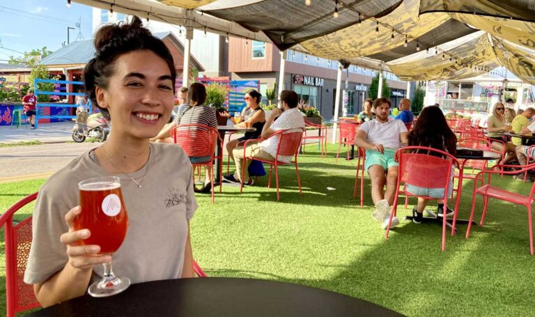 The author Abigail Bliss enjoying her glass of beer from Ratio Beerworks