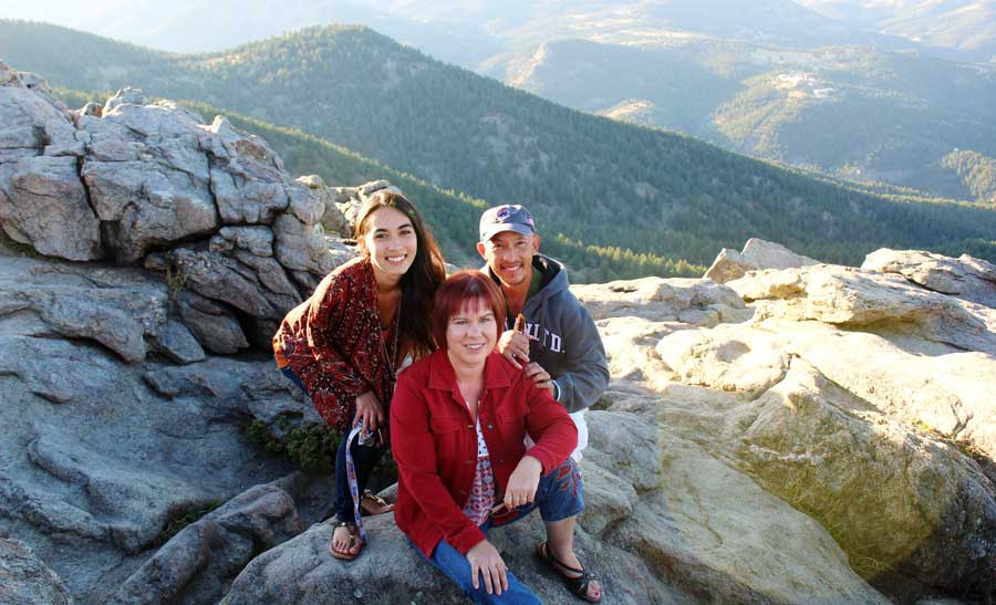 Travel Lemming editor Abigail with her parents on Flagstaff Mountain