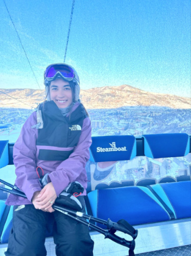 The author Abigail riding the Blue River Gondola