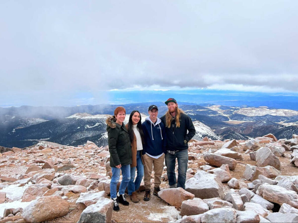 The author Abigail with her family at the Pikes Peak summit