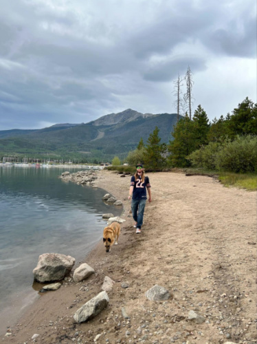 Travel Lemming Editor Abigail Bliss' husband and their dog walking around Dillon Reservoir