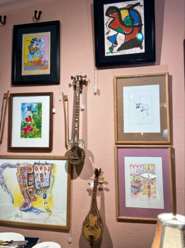 View of the displayed abstract drawings of Jerry Garcia at a shop in downtown Santa Cruz
