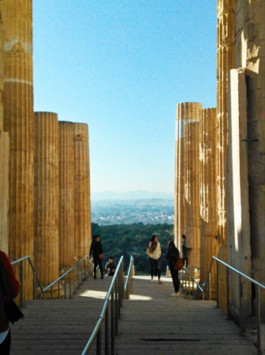 People wandering around the Acropolis of Athens