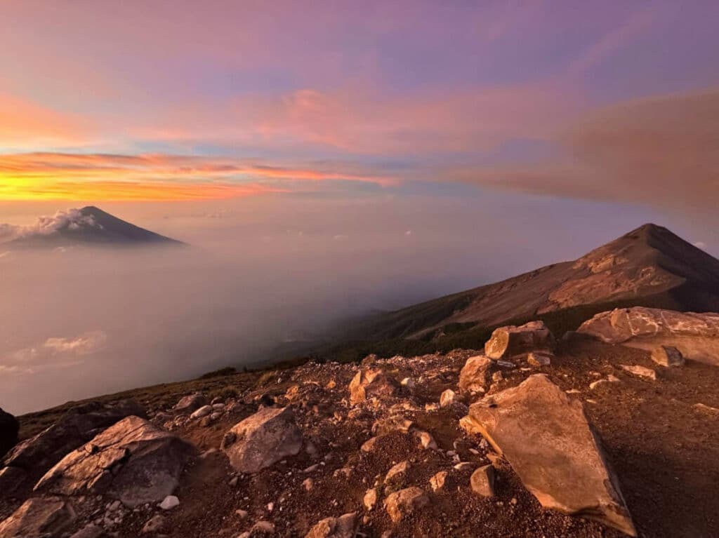 Colorful sky over the Agua Volcano and Fuego Volcano