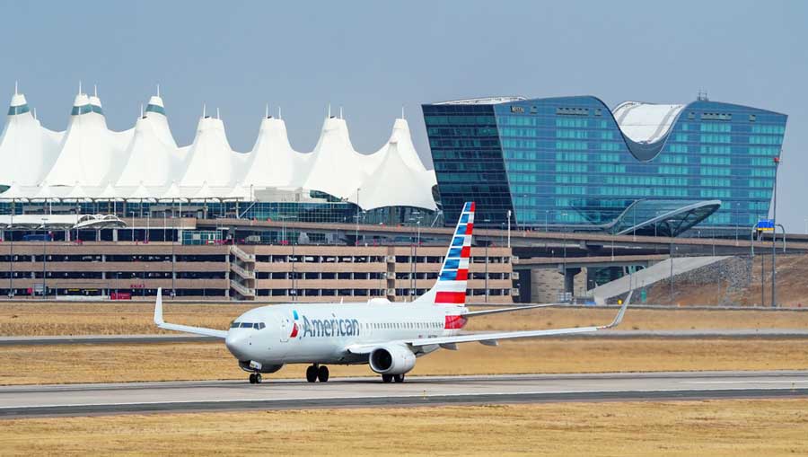An airplane on the runway of Denver International Airport