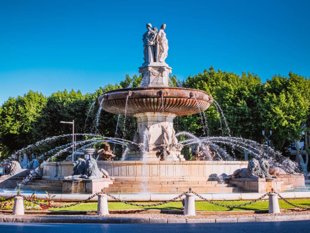 Clear blue sky over a water fountain in Aix-en-Provence
