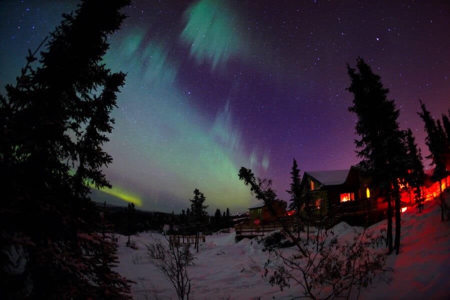 View of the aurora borealis over the cabins
