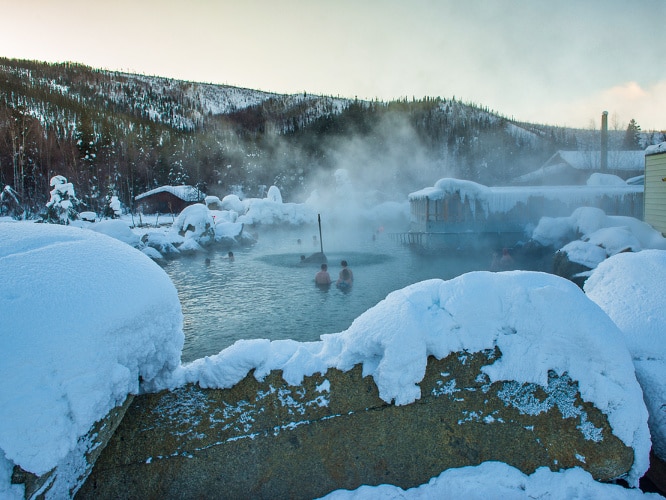 View of the people enjoying the hot spring in Chena Hot Springs during winter