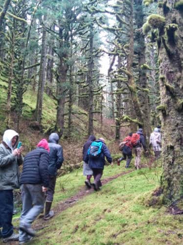 People covered with layers during a hike in Alaska