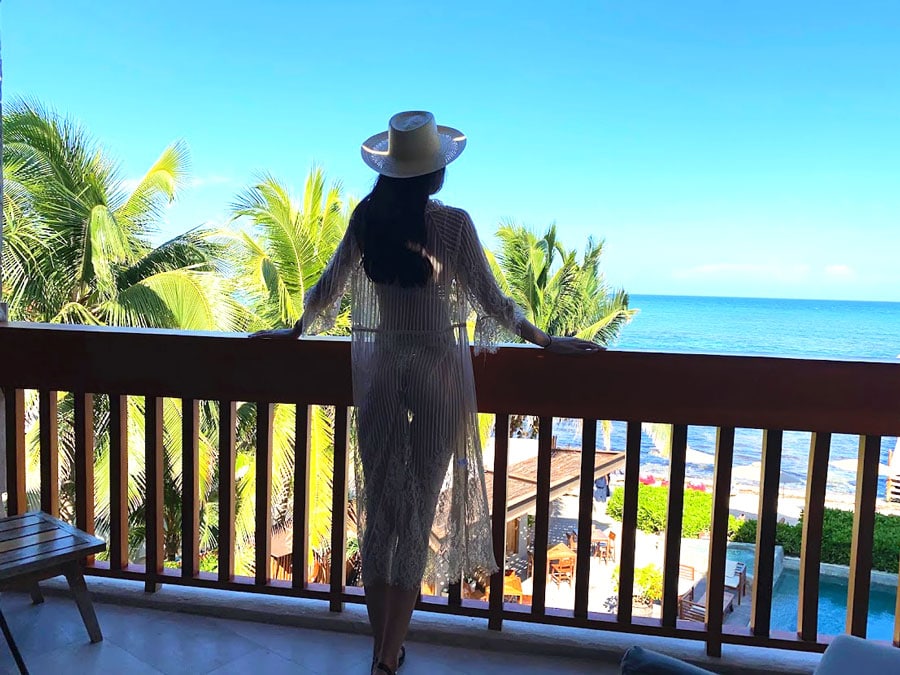 Clara admiring the ocean view from Alea Tulum
