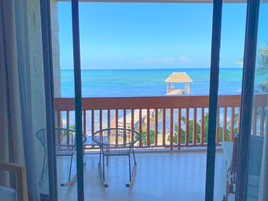 View of the balcony and the ocean from the room in Alea Tulum Resort