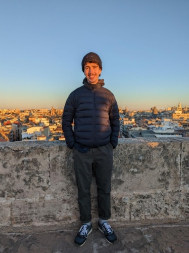Alex Brotherton smiing for a photo in Valencia, Spain