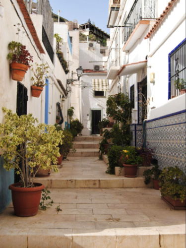 A staircase surrounded by white architecture