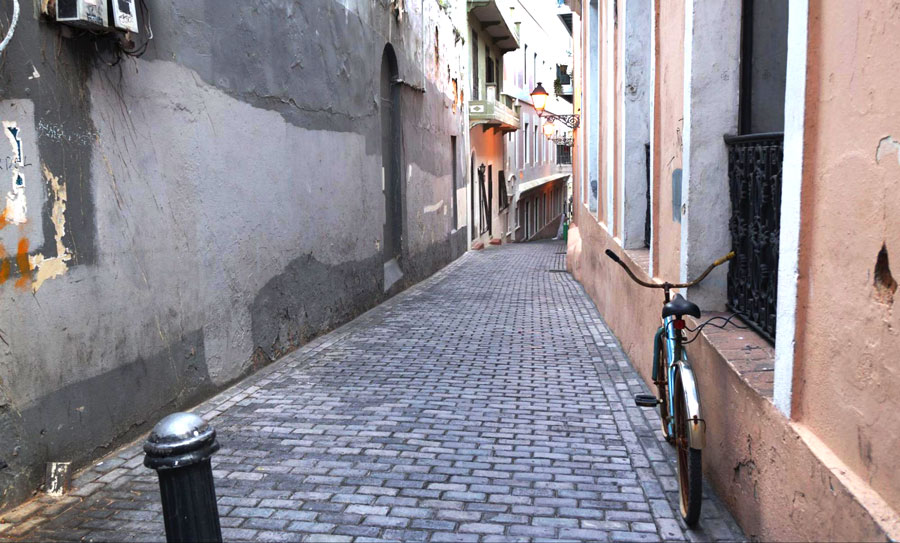 View of a bike in an alleyway