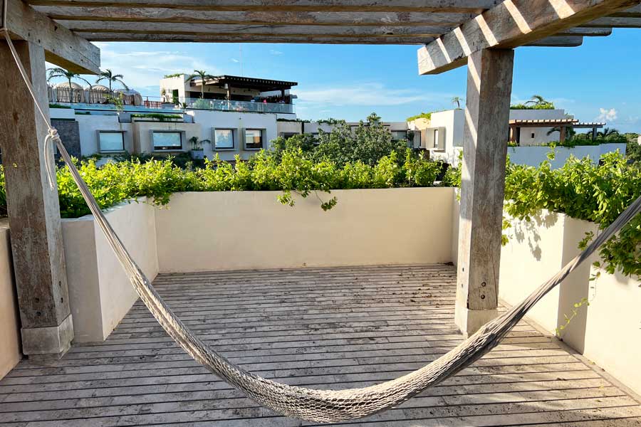 A hammock at the rooftop of Aloft Tulum