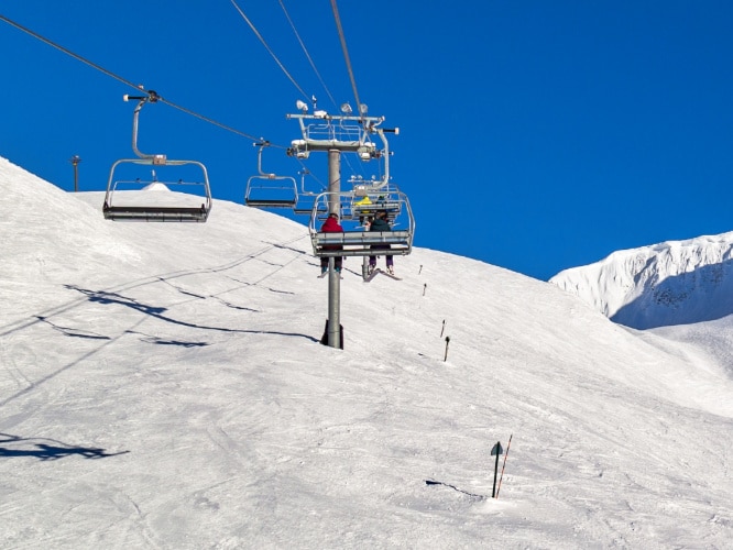 View of the chairlifts at Alyeska Ski Resort on a sunny winter day