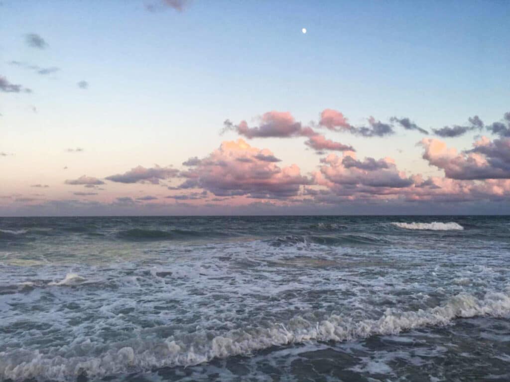 View of the waves crashing in Amelia Island at sunset