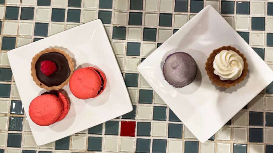 Miniature tarts and macarons from Amelie’s French Bakery & Cafe