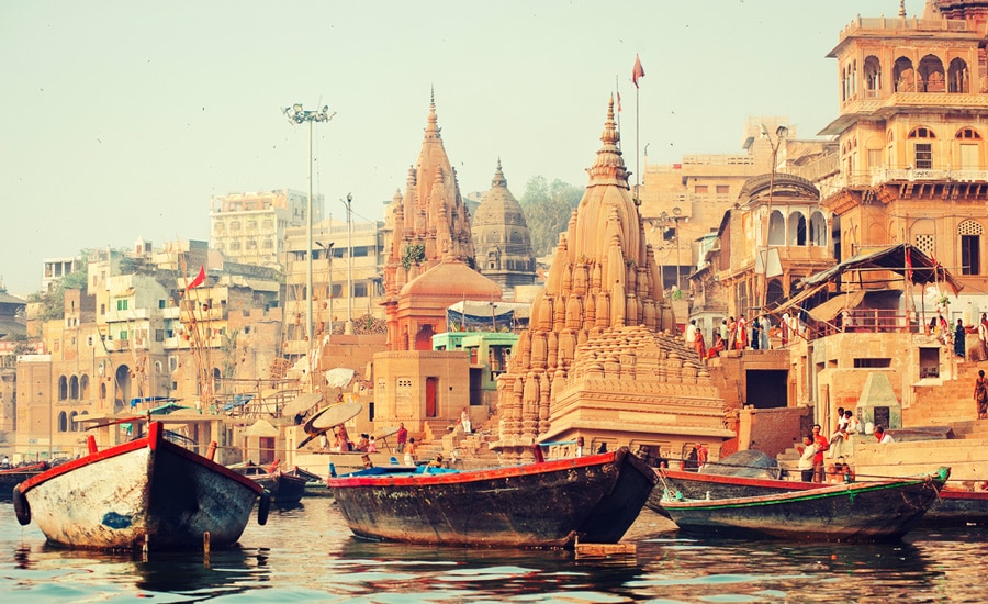 View of boats sailing on the water during Ancient time in Varanasi City