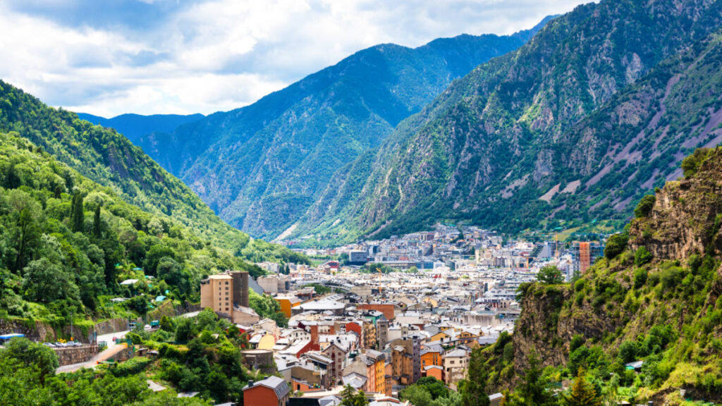 Aerial view of the Andorra la Vella surrounded by lush mountains