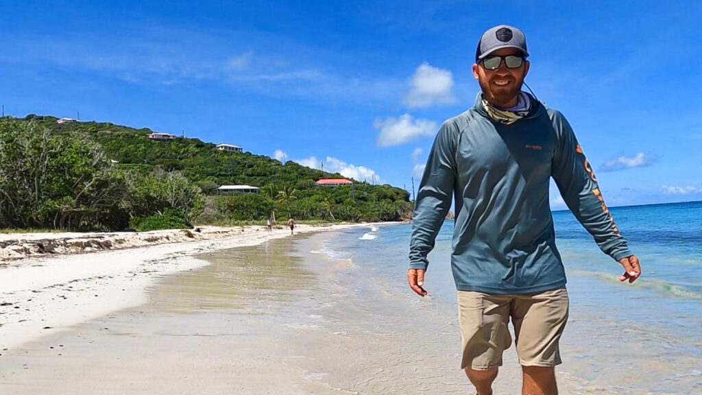 The author wearing a UPF clothing at the beach on a sunny day