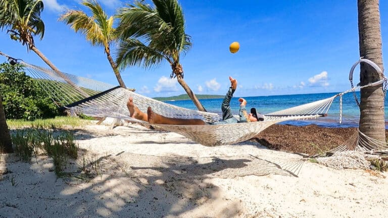 The author Andrew Bloem playing the ball while in a hammock in a St. Croix Beach