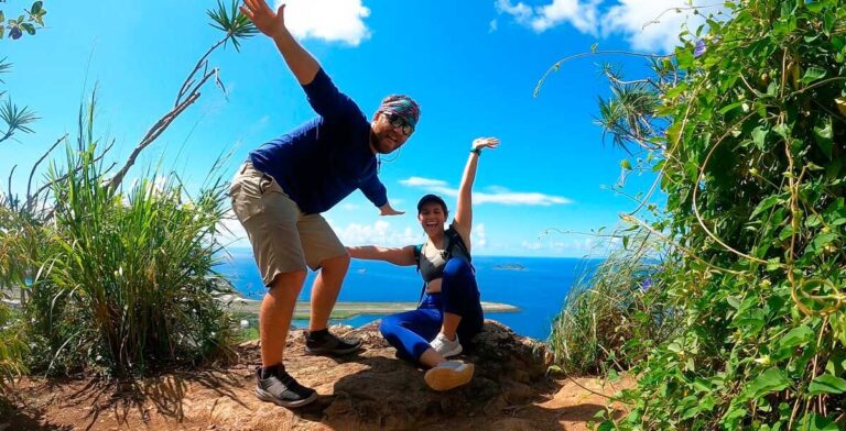 The author Andrew Bloem with his wife posing for a photo at the top of John Brewers Rock